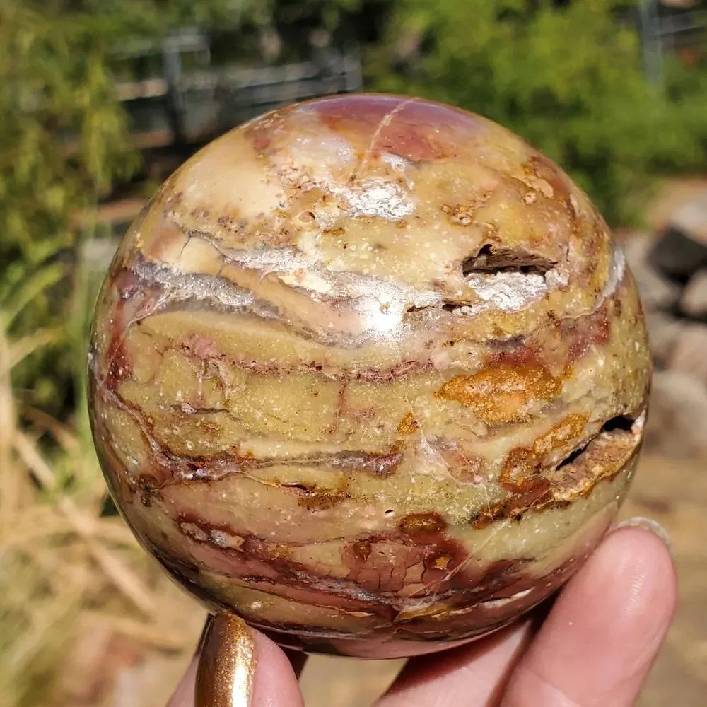 Pink Ocean Ibis Jasper Brecciated Sphere w/ Caves Druzy 458 grams 71mm